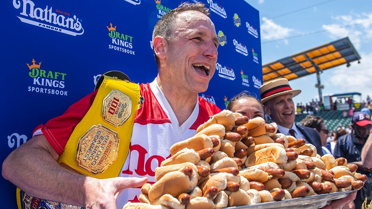 Joey Chestnut to compete in Nathan's Hot Dog Eating Contest after being forced to miss 2024 event  at george magazine