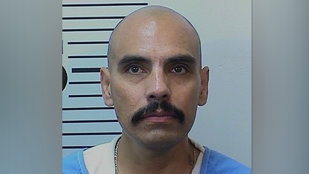 Death row inmate killed in California prison as guards deploy blast grenades to control violent mob attack