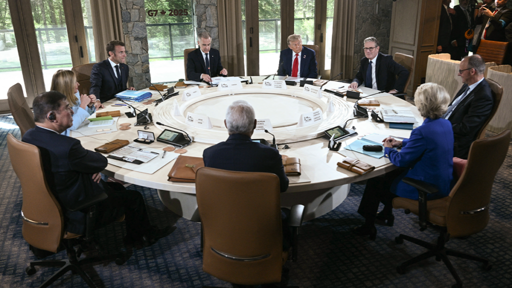 Meloni caught giving ‘eye roll of the century’ while Macron whispered in her ear during high-stakes G7 meeting