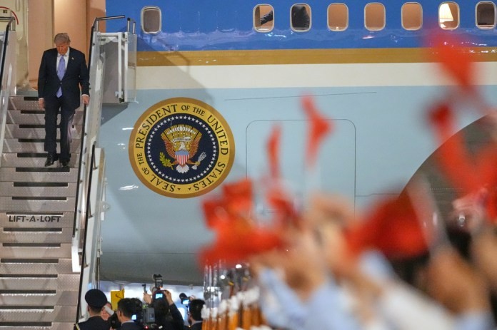 China rolls out the red carpet, American flags, and military honor guard for Trump’s arrival in Beijing