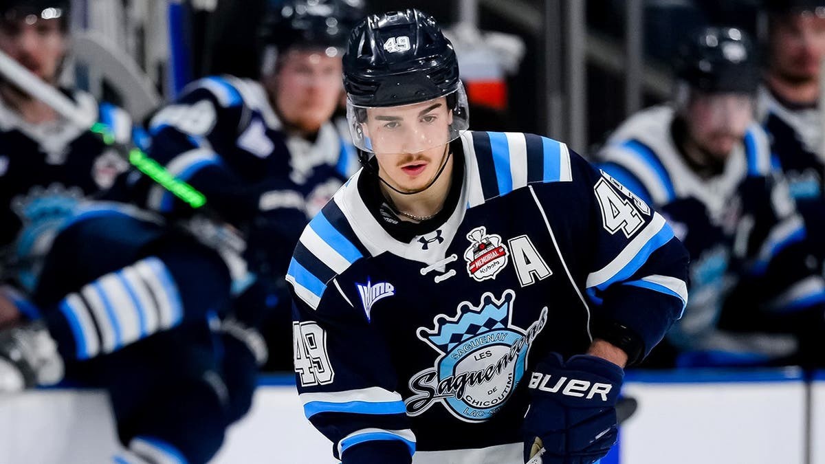 Junior hockey player suspended for rest of major tournament after stomping on opponent's foot at george magazine