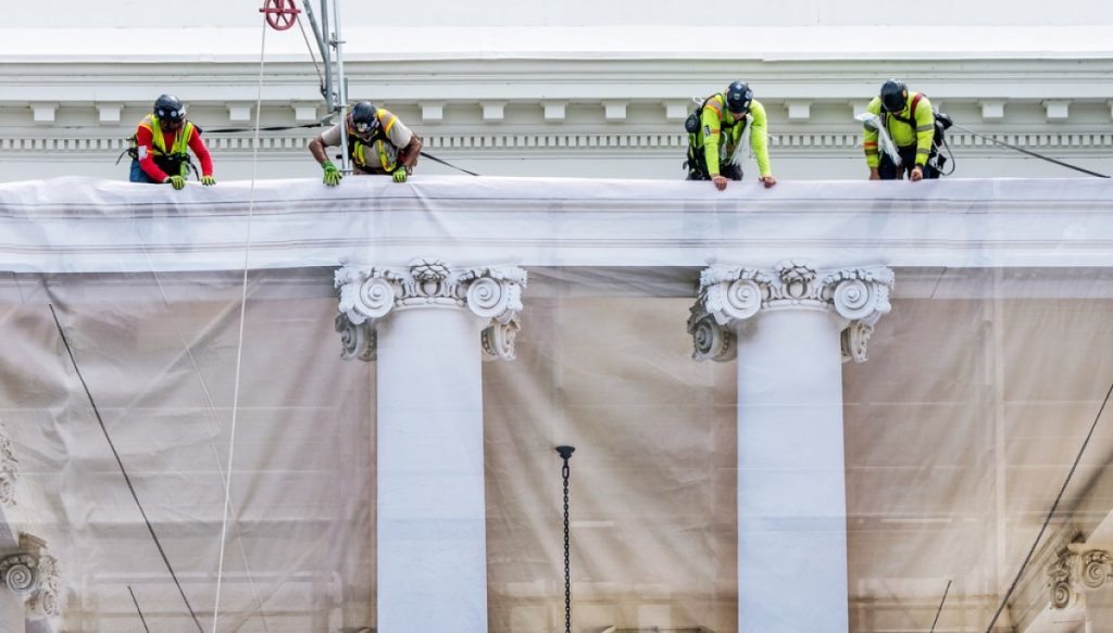 White House drapes tarps while completing Trump’s newest construction project