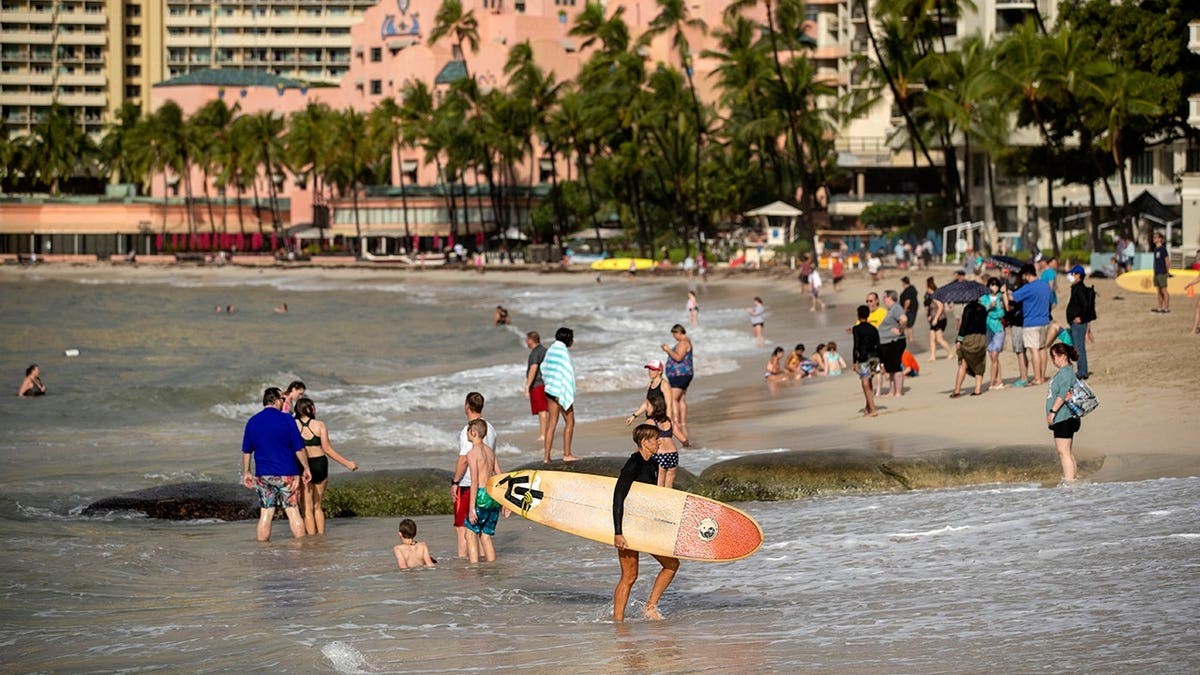 Tulsi Gabbard's brother charged after allegedly trying to lure children to Waikīkī hotel room: police at george magazine