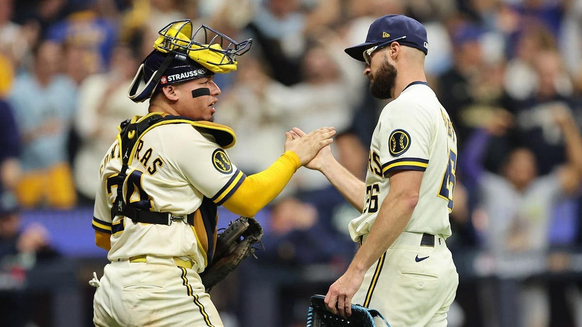 Brewers complete wild Game 2 comeback after controversial call puts them up 2-0 in World Series vs Rays at george magazine