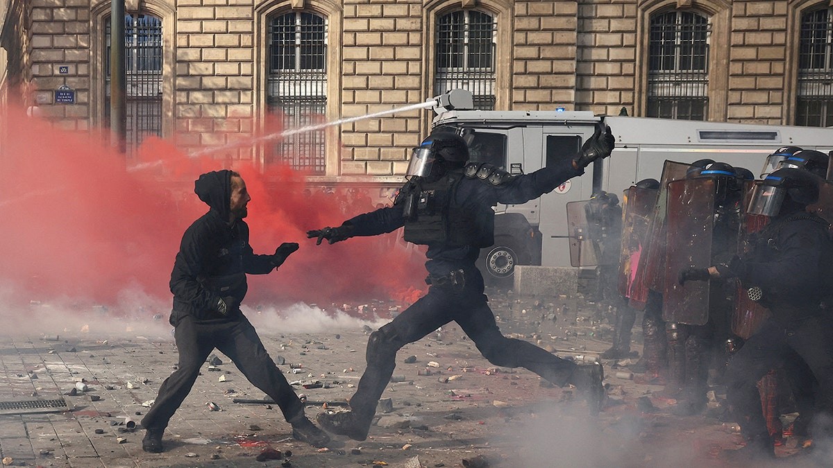 Violence erupts at France protests as Macron warns unrest is being exploited at george magazine