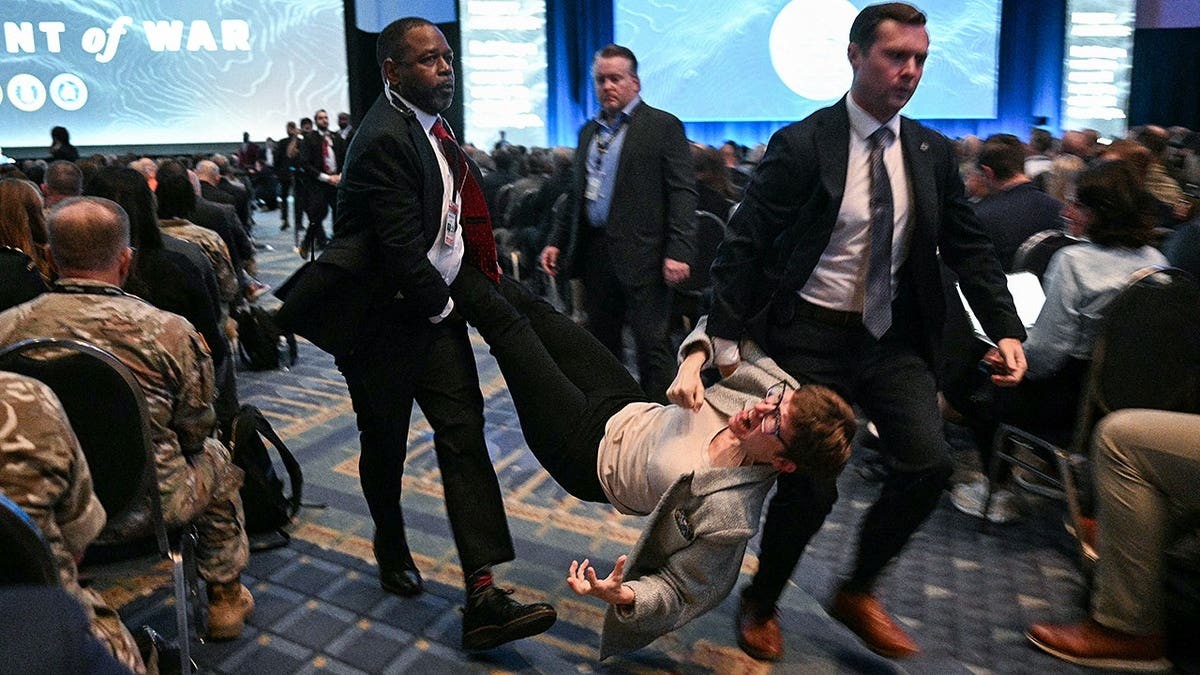 Foul-mouthed anti-war protesters repeatedly derail Hegseth's remarks at Army event in DC  at george magazine