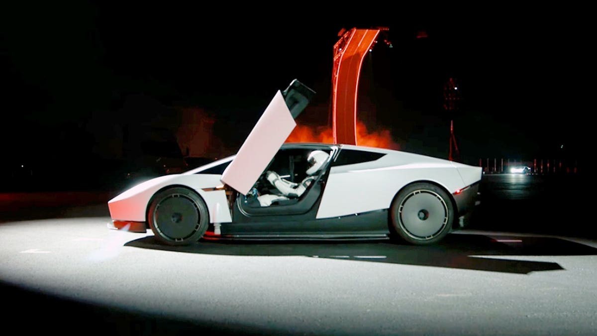 Tesla Roadster flies, flips and hits 60 mph in a flash at george magazine